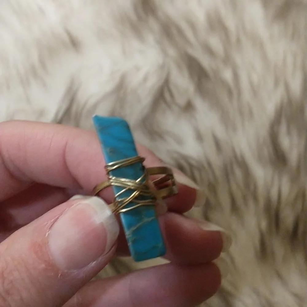 Super cute gold wire wrapped faux turquoise adjustable ring.